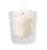 White candle in a clear glass holder on a white background